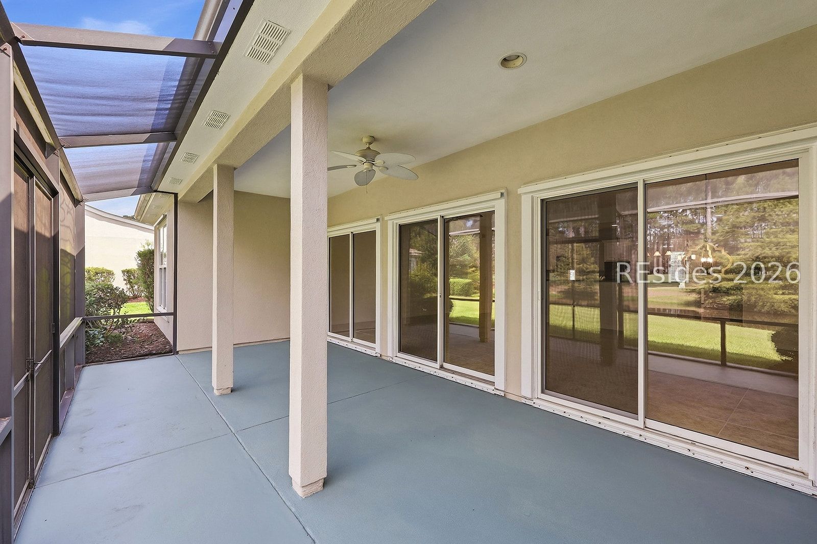 108 Landing Lane Bluffton, SC 29909 - Photo 19 of 63 Large screened lanai with lagoon to golf views