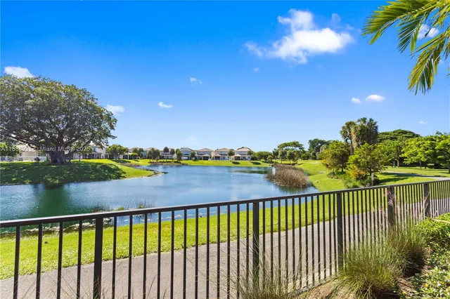 a view of a lounge chairs with a patio