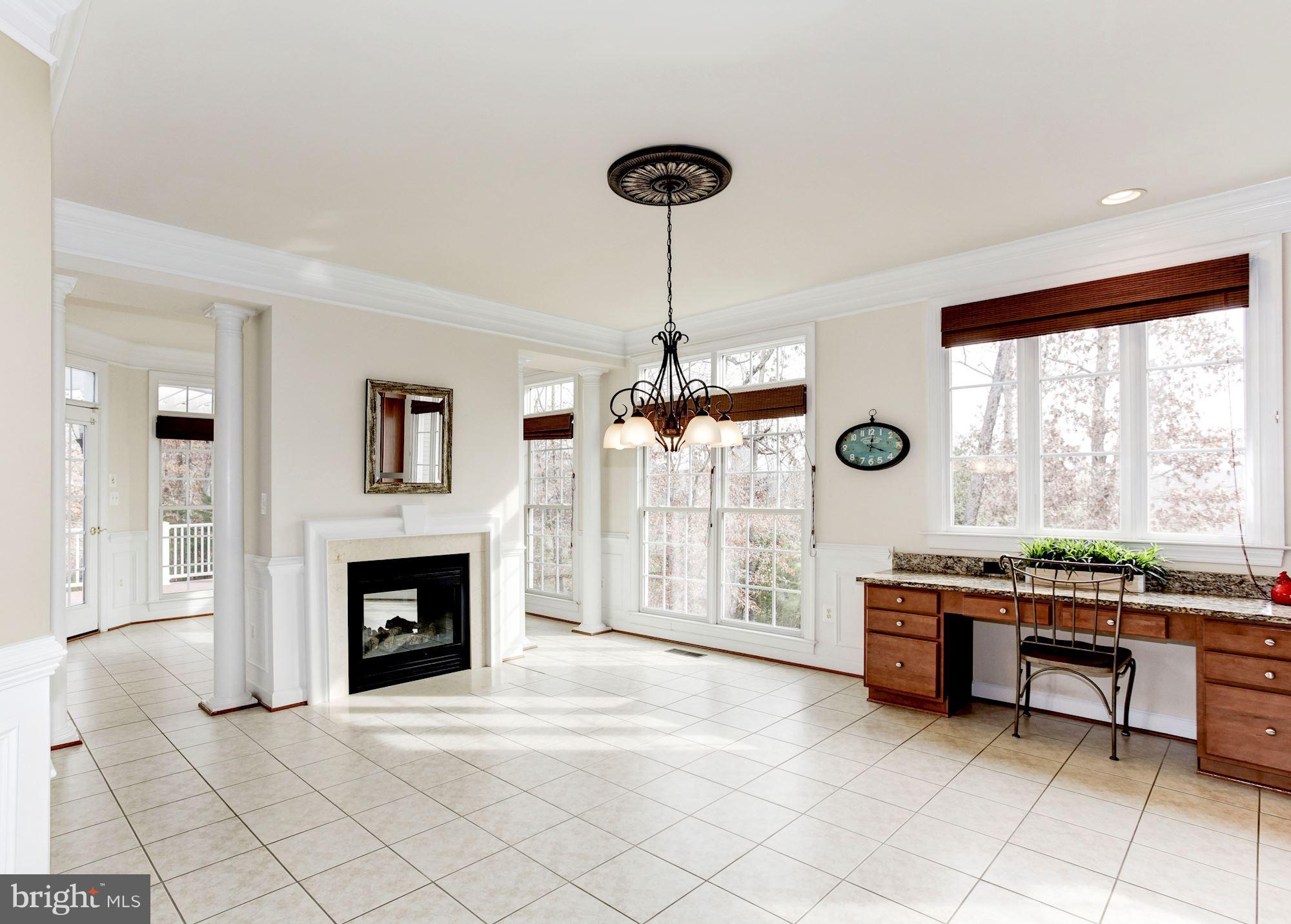 4600 Ryecliff Court Woodbridge, VA 22192 - Photo 11 of 30 Kitchen with double sided fireplace