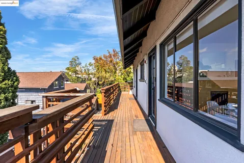 a view of balcony with a potted plant