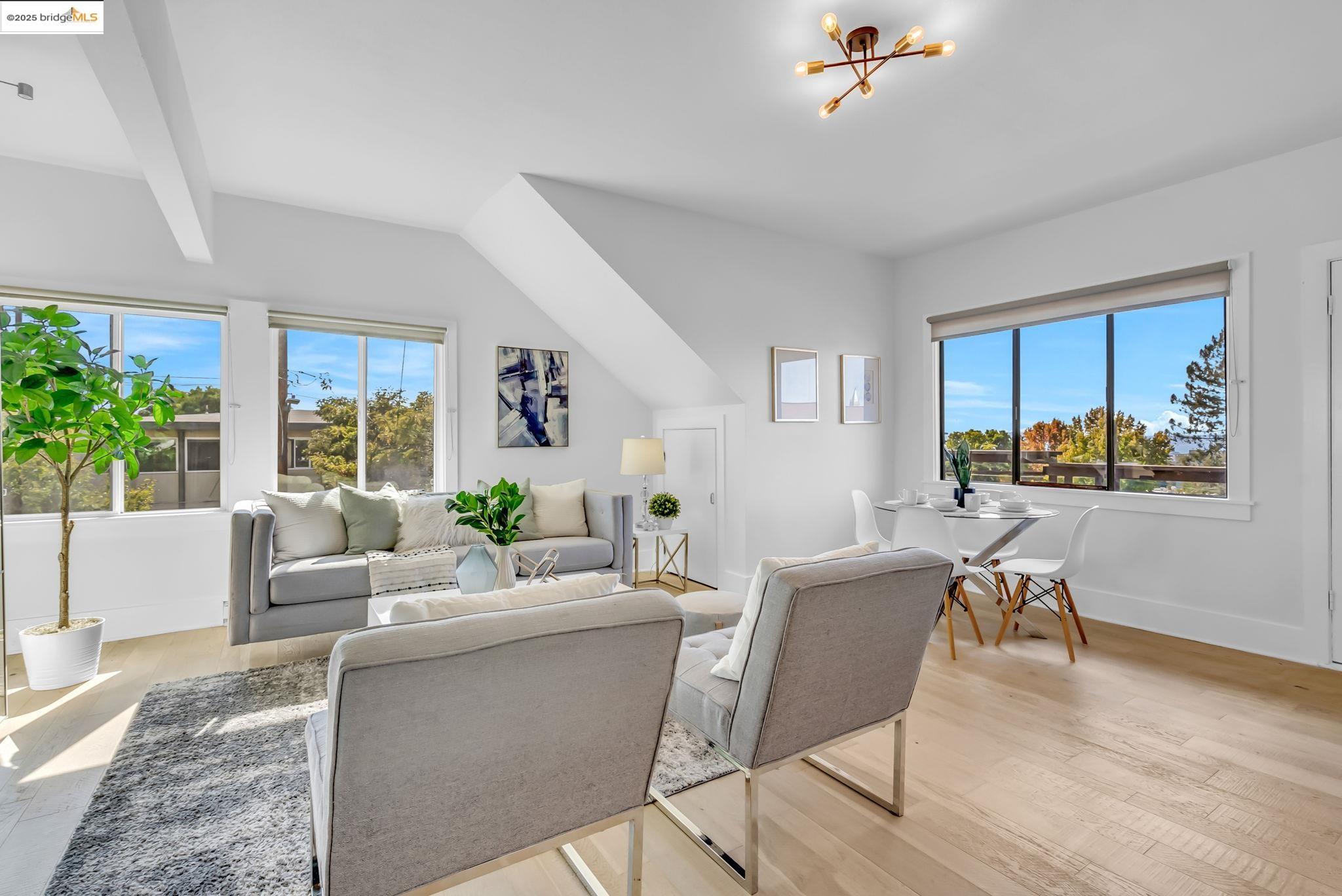 2907 Channing Way Berkeley, CA 94704 - Photo 13 of 26 a living room with furniture and a table