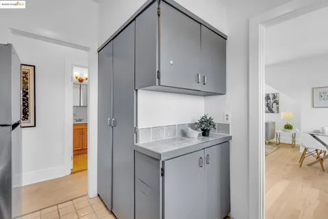 a kitchen with appliances and cabinets