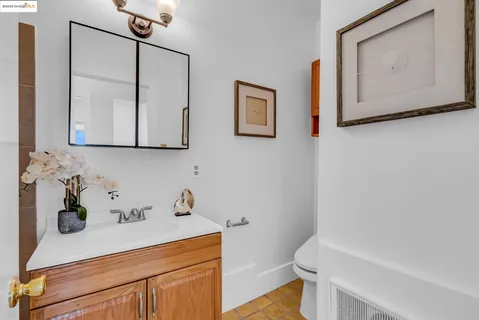 a bedroom with a bed and hallway