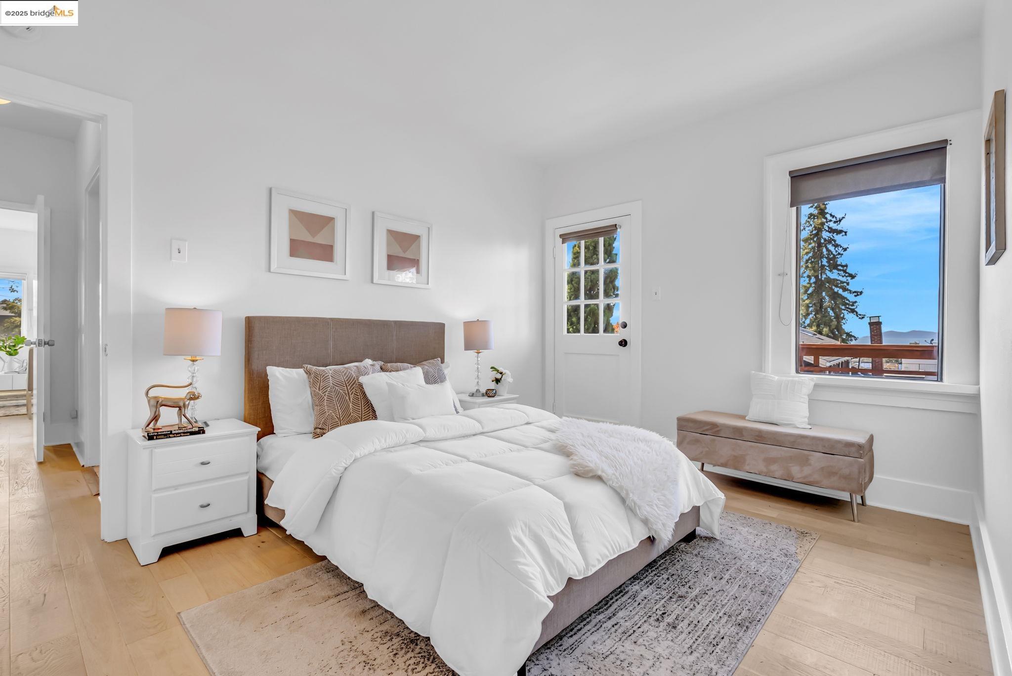 2907 Channing Way Berkeley, CA 94704 - Photo 23 of 26 a bedroom with a bed and a couch