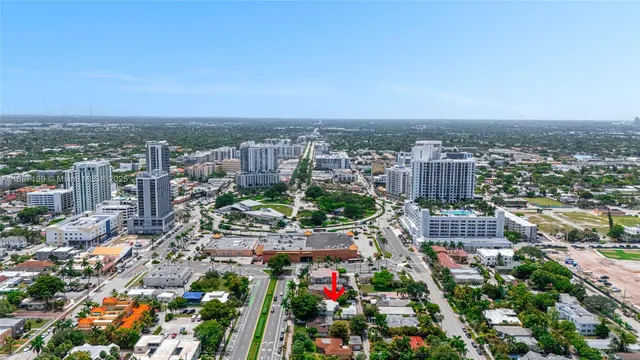 a bedroom with two beds and a couch