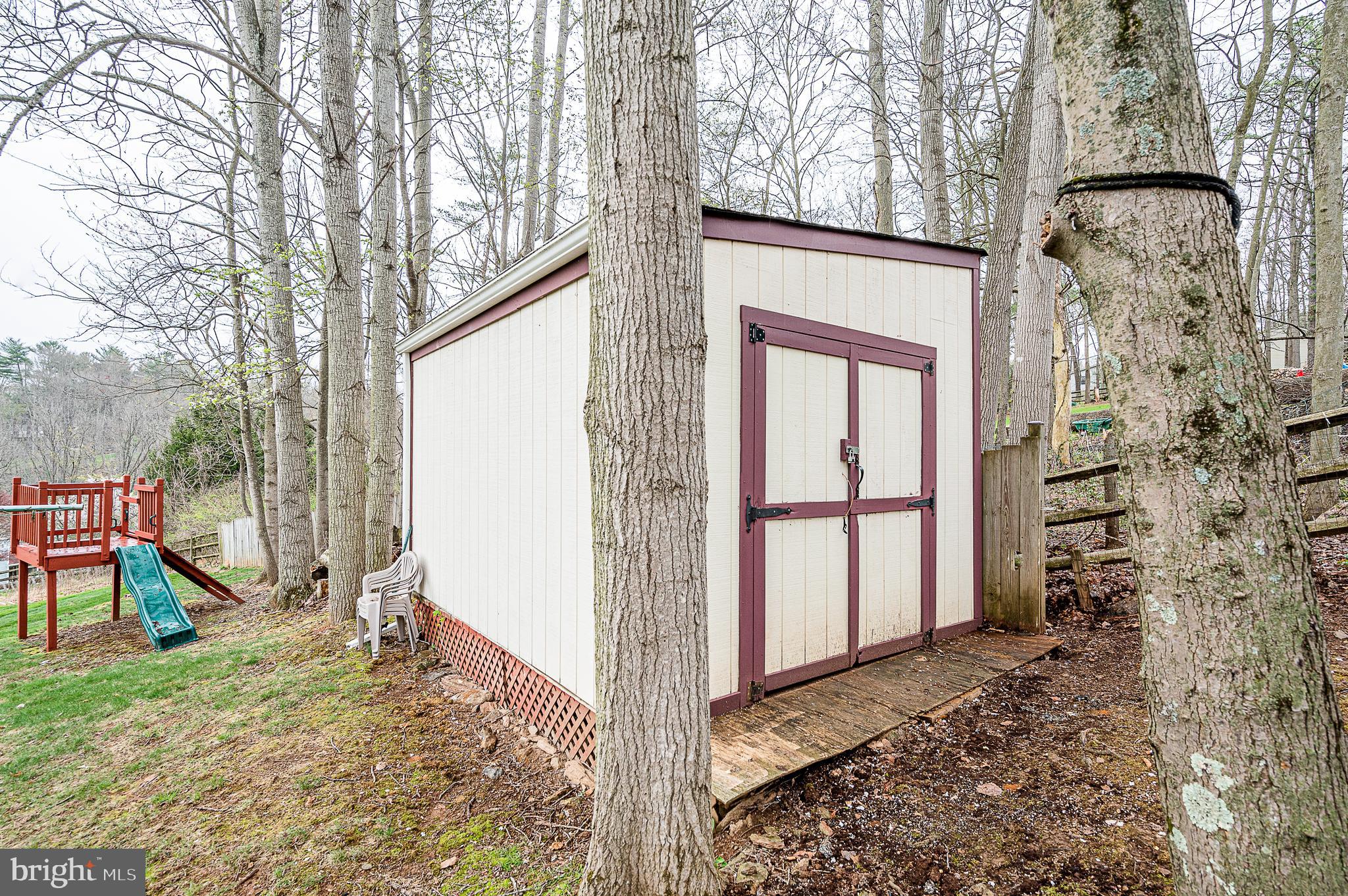 2700 Overview Road Hampstead, MD 21074 - Photo 39 of 42 shed, clothesline and play-set convey