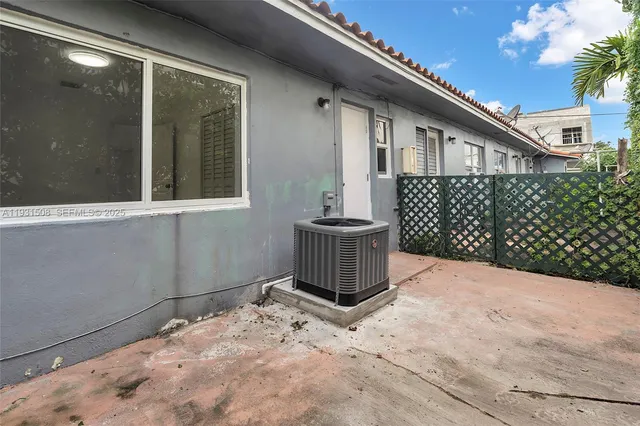 a view of a backyard of a house