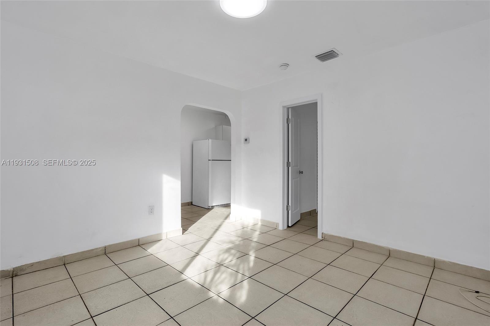 634 Southwest 10th Street, Unit 4 Miami, FL 33130 - Photo 5 of 19 a view of an empty room and window