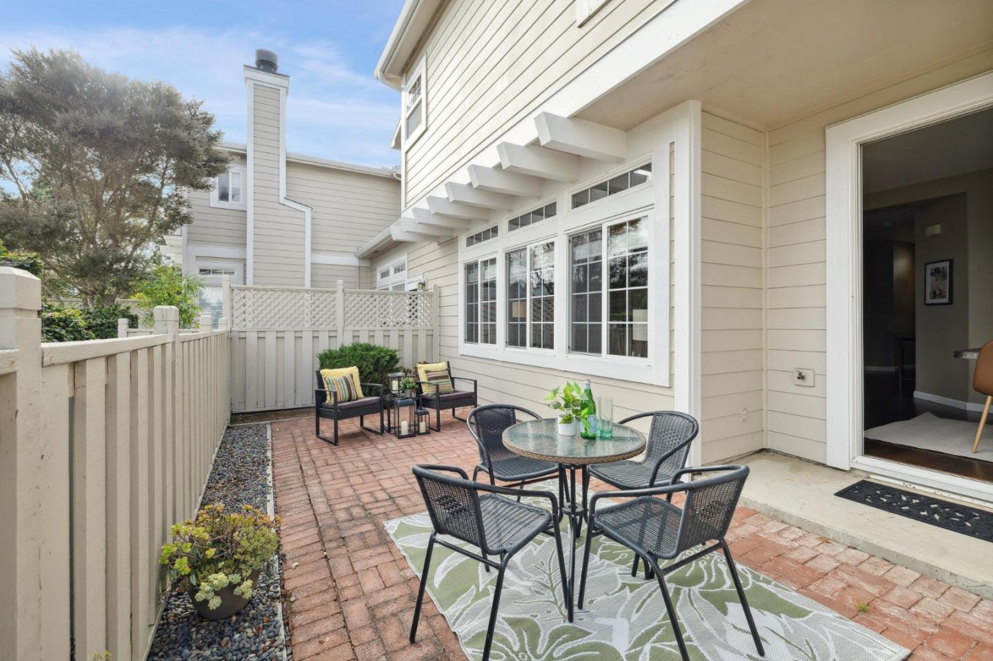 6 Outlook Circle Pacifica, CA 94044 - Photo 41 of 49 a view of a patio with table and chairs and potted plants