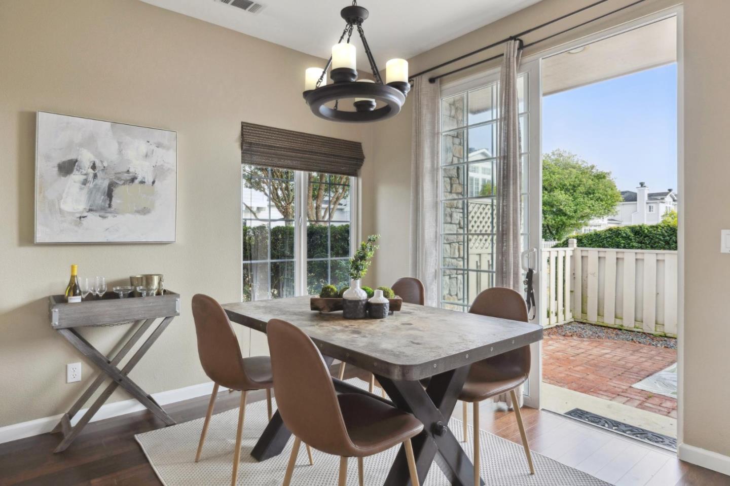 6 Outlook Circle Pacifica, CA 94044 - Photo 7 of 49 a dining room with furniture a chandelier and wooden floor