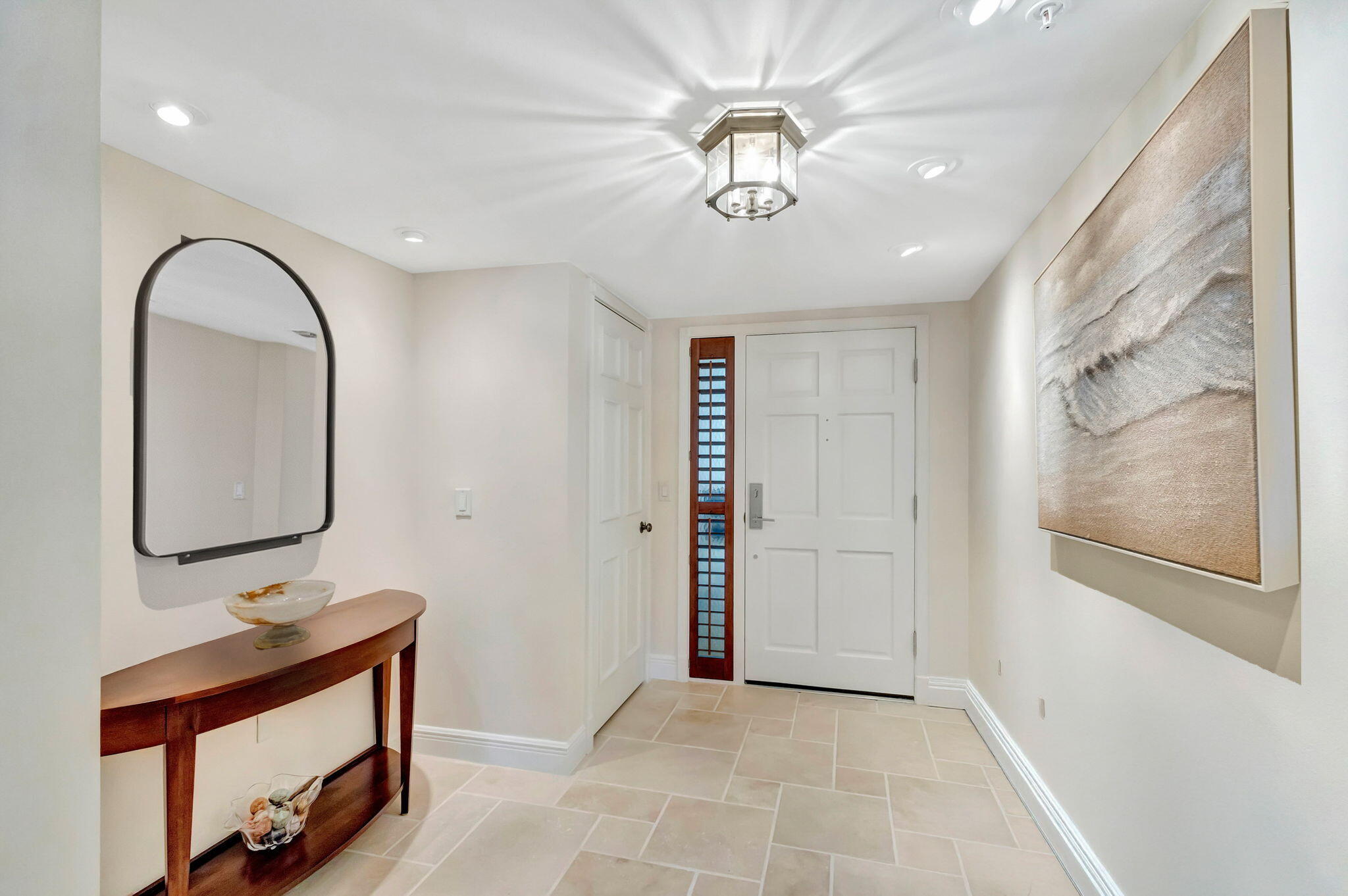 400 South Beach Road, Unit 804 Tequesta, FL 33469 - Photo 3 of 65 a view of an entryway with wooden floor