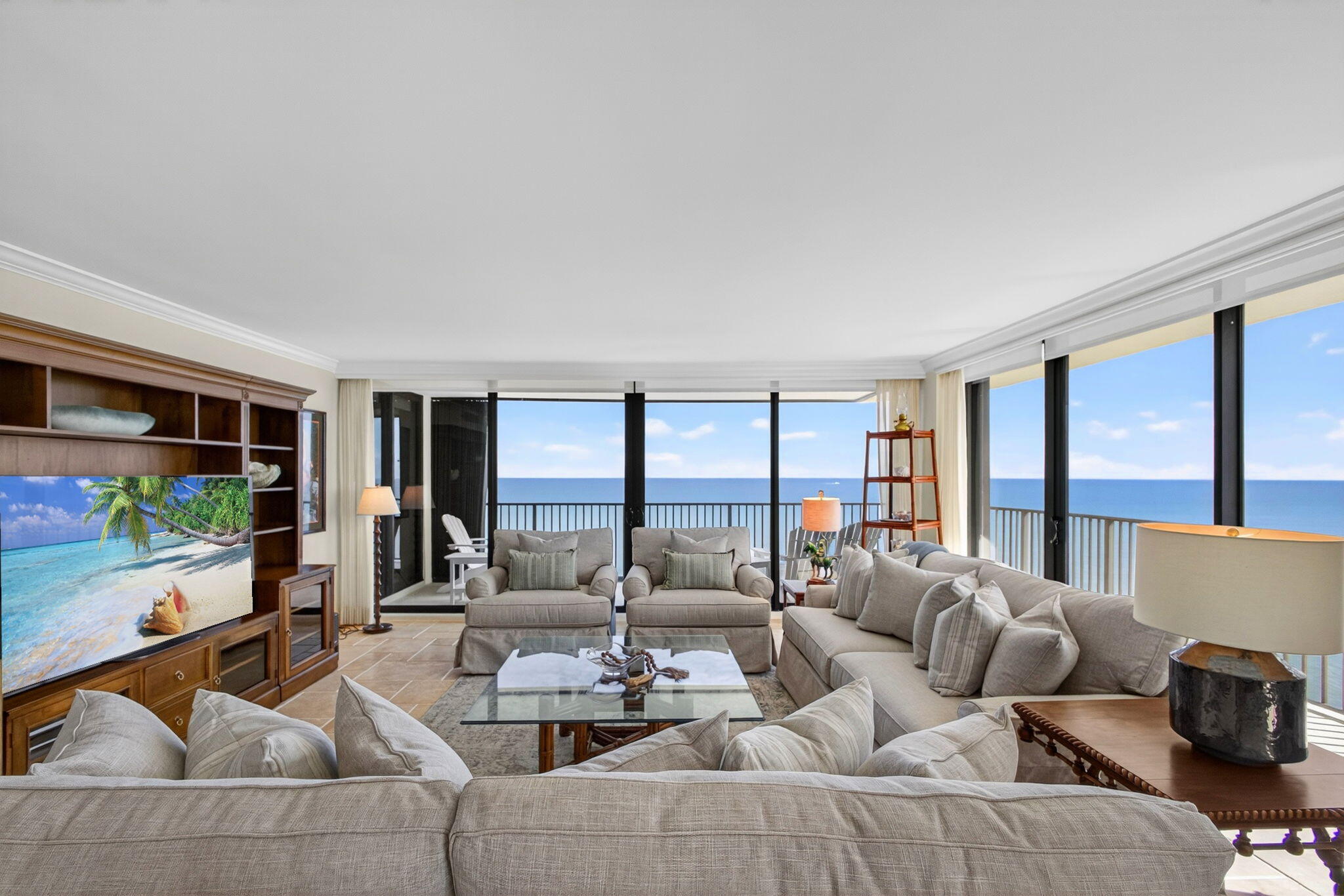 400 South Beach Road, Unit 804 Tequesta, FL 33469 - Photo 9 of 65 a living room with furniture and a large window
