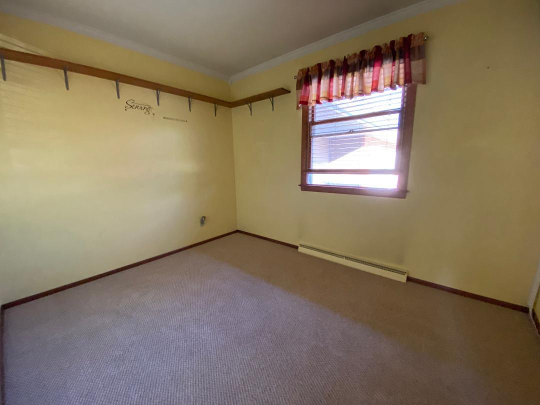 306 Andrew Street Dwight, IL 60420 - Photo 14 of 25 a view of an empty room with a window