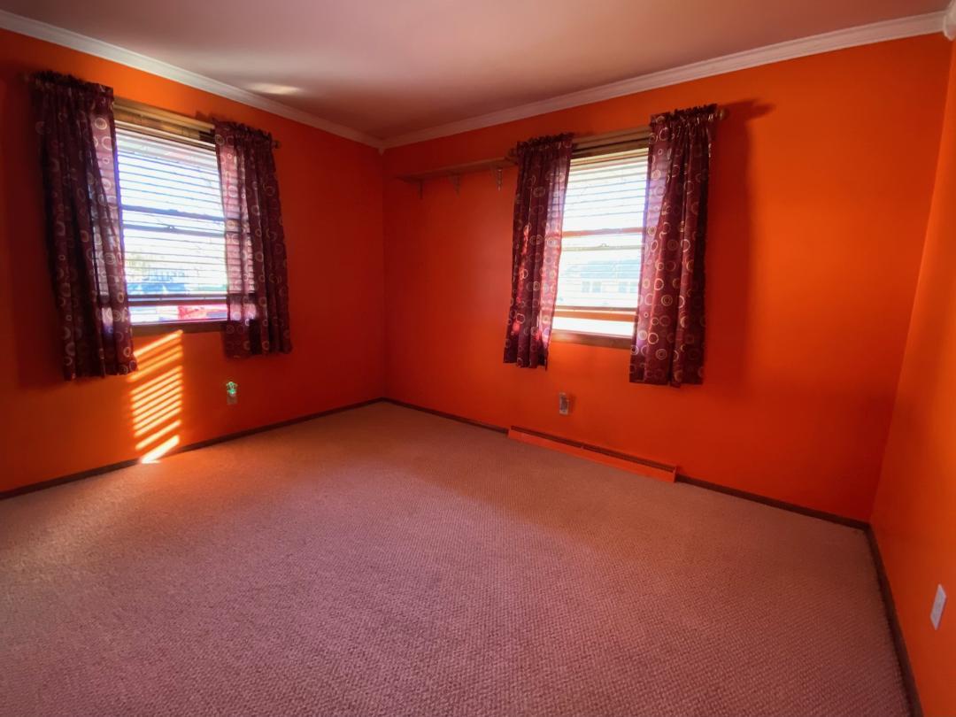 306 Andrew Street Dwight, IL 60420 - Photo 15 of 25 an empty room with a window
