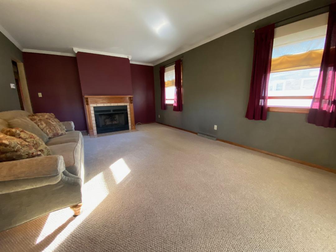 306 Andrew Street Dwight, IL 60420 - Photo 4 of 25 a view of livingroom with furniture and windows