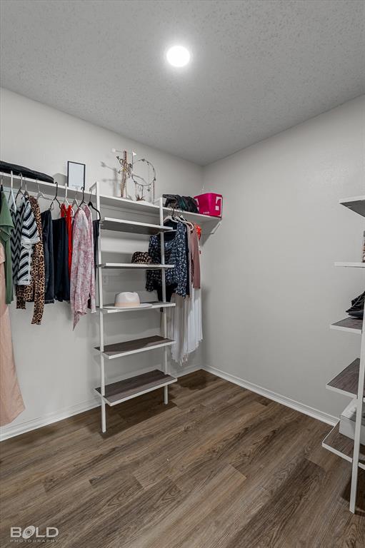 5505 Hickory Ridge Drive Bossier City, LA 71111 - Photo 20 of 36 a view of walk in closet with clothes and shoes