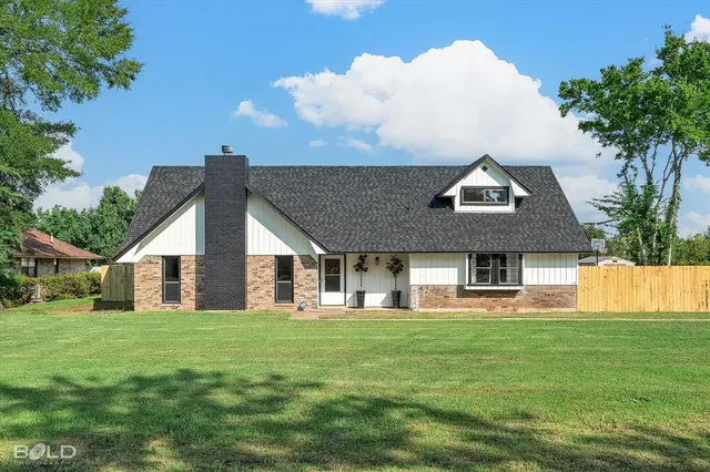 a front view of house with yard