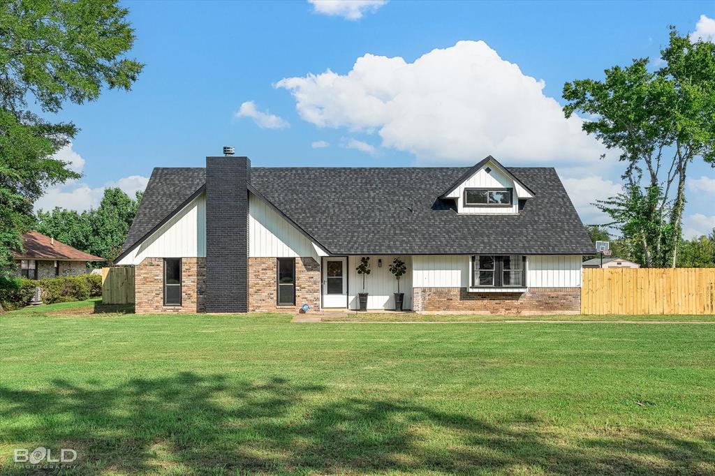 5505 Hickory Ridge Drive Bossier City, LA 71111 - Photo 3 of 36 a front view of house with yard