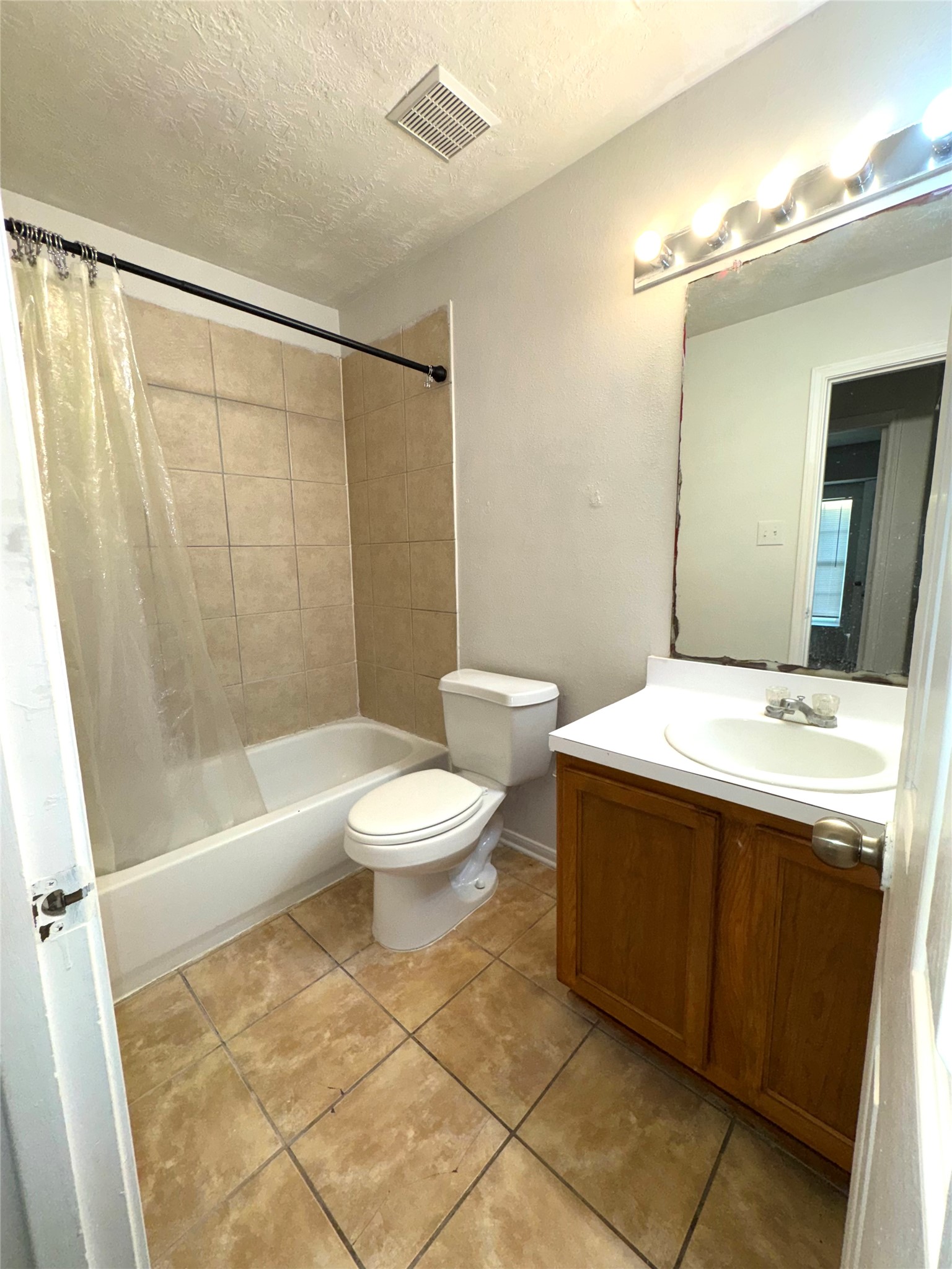 15931 Winston Point Lane Houston, TX 77084 - Photo 13 of 30 a bathroom with a sink toilet and shower