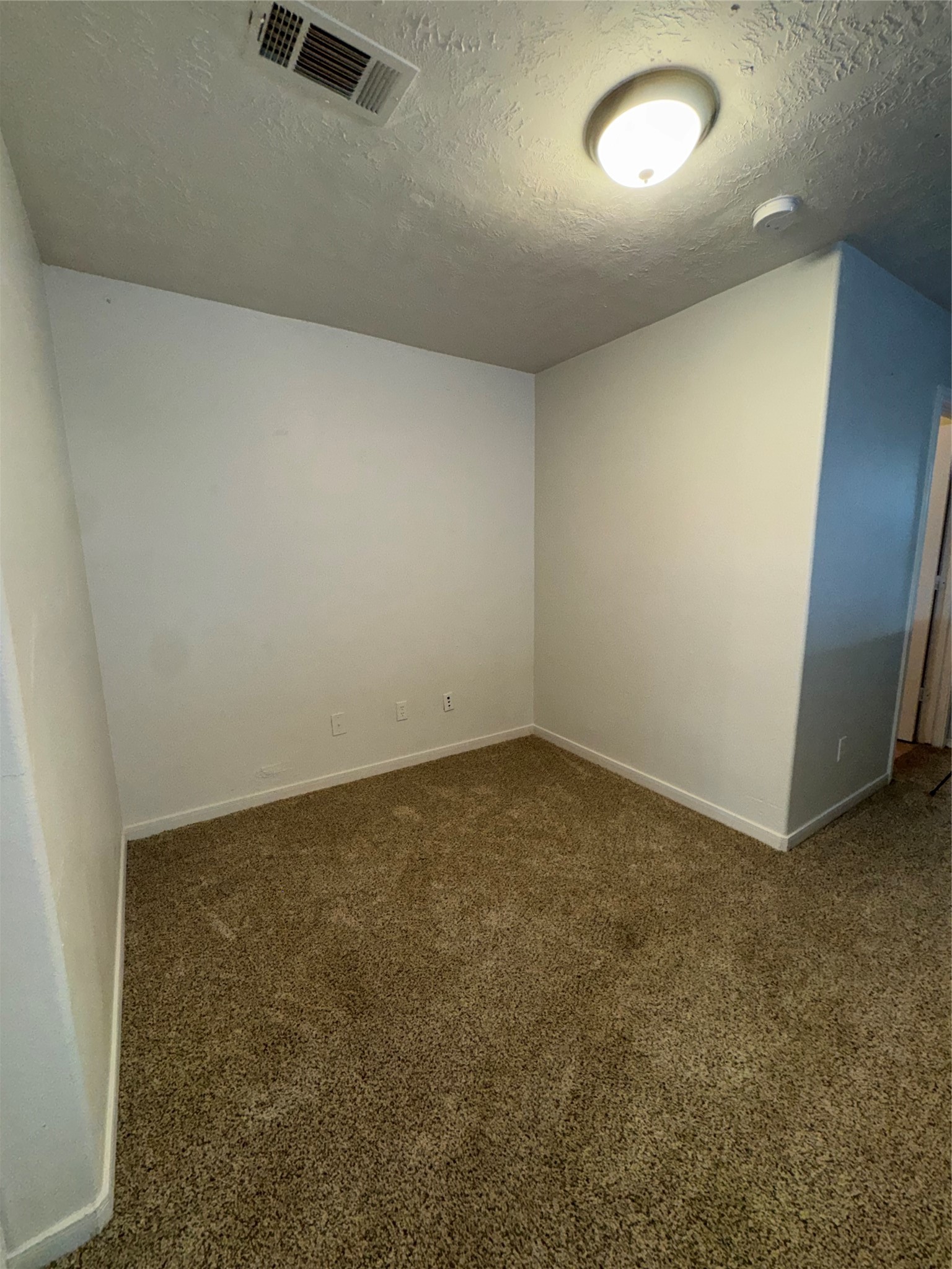 15931 Winston Point Lane Houston, TX 77084 - Photo 24 of 30 an empty room with a workbench