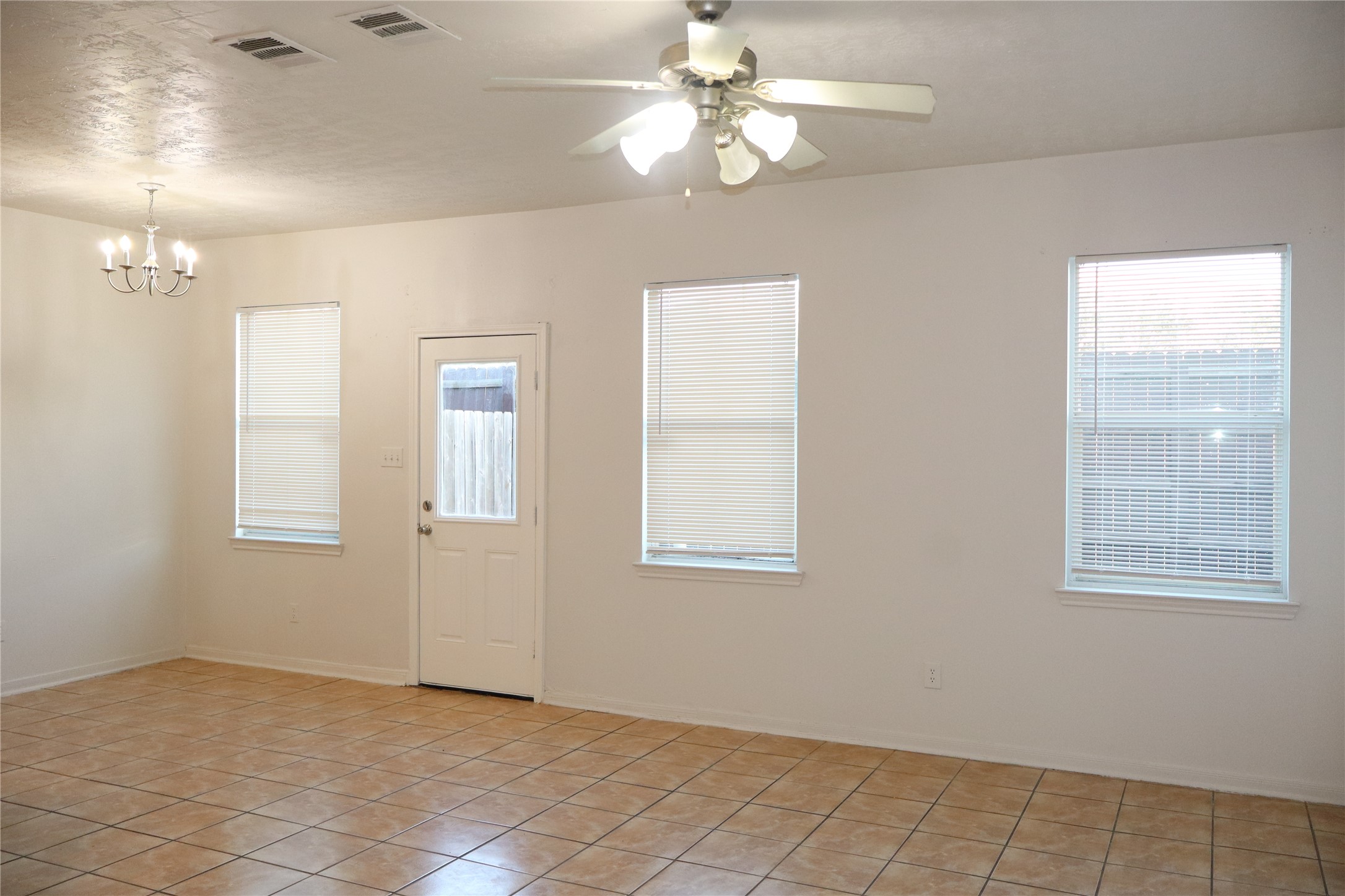 15931 Winston Point Lane Houston, TX 77084 - Photo 6 of 30 a view of an empty room with a window