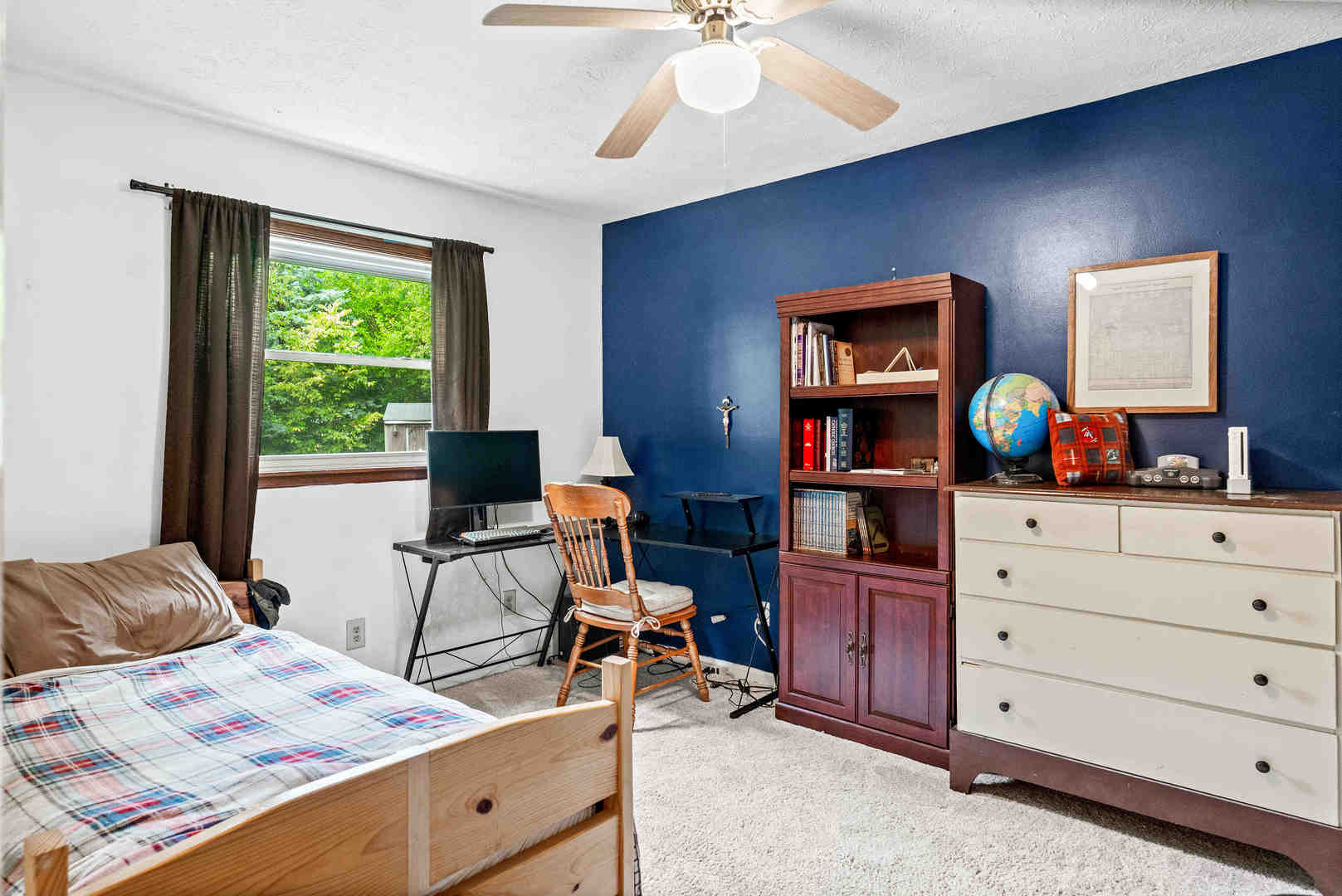 108 Cardinal Drive Le Roy, IL 61752 - Photo 16 of 33 a view of a workspace with furniture and a window