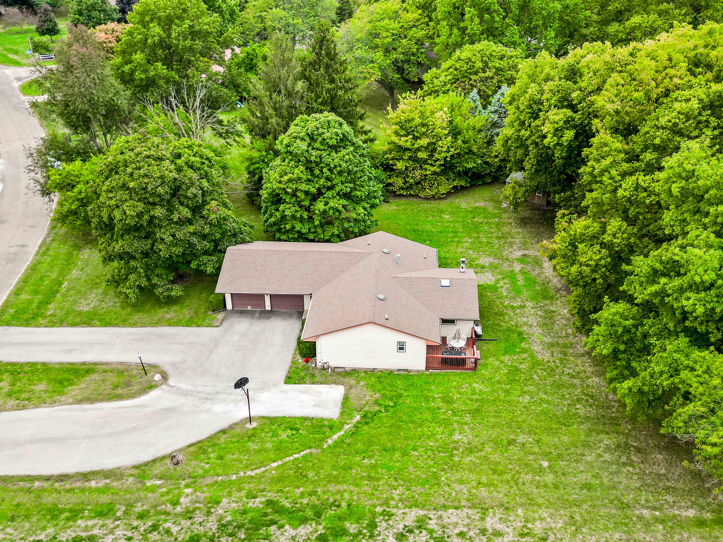 108 Cardinal Drive Le Roy, IL 61752 - Photo 31 of 33 an aerial view of a house with a garden