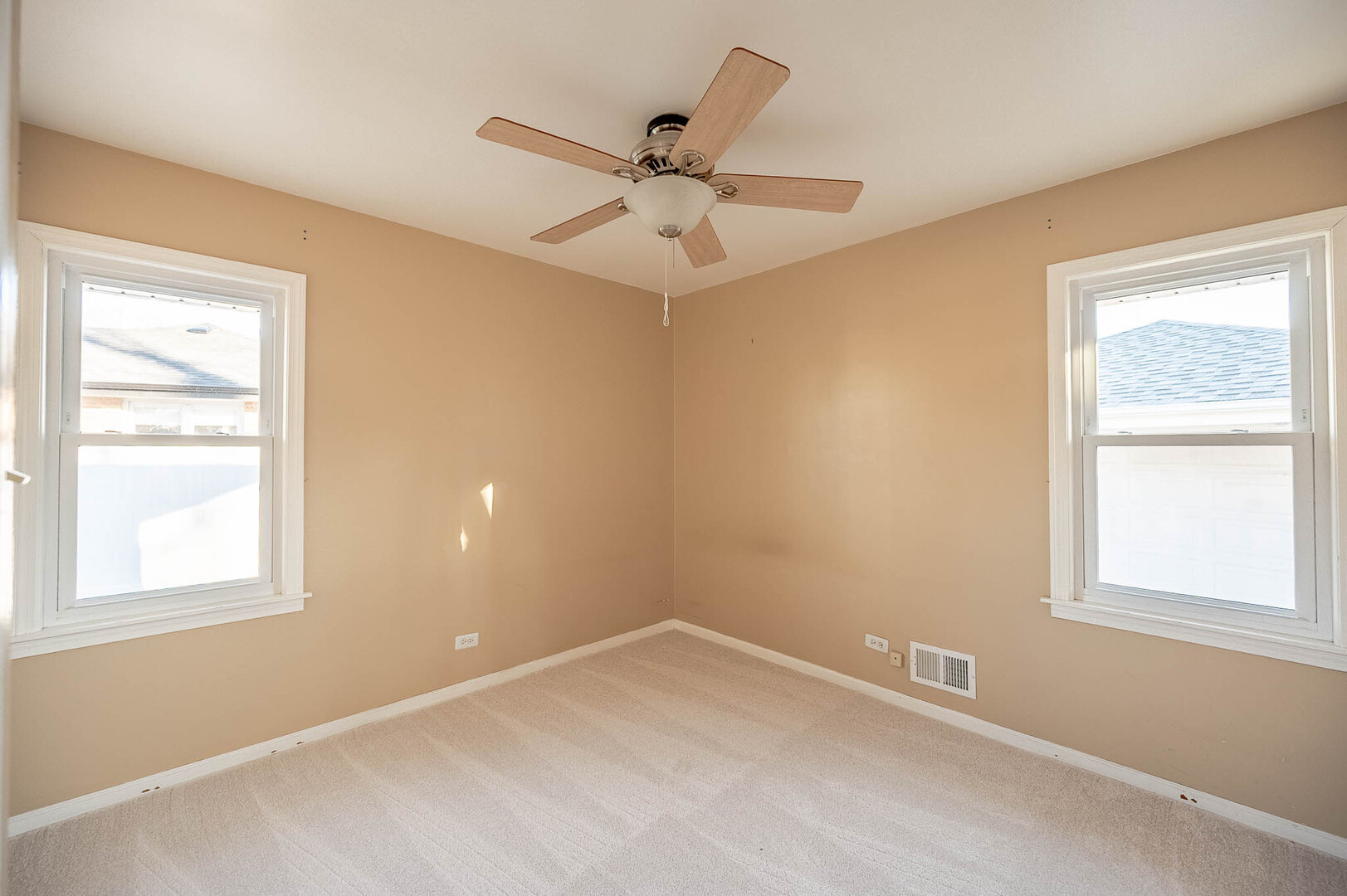 5919 West 109th Street Chicago Ridge, IL 60415 - Photo 8 of 14 an empty room with a window and a fan