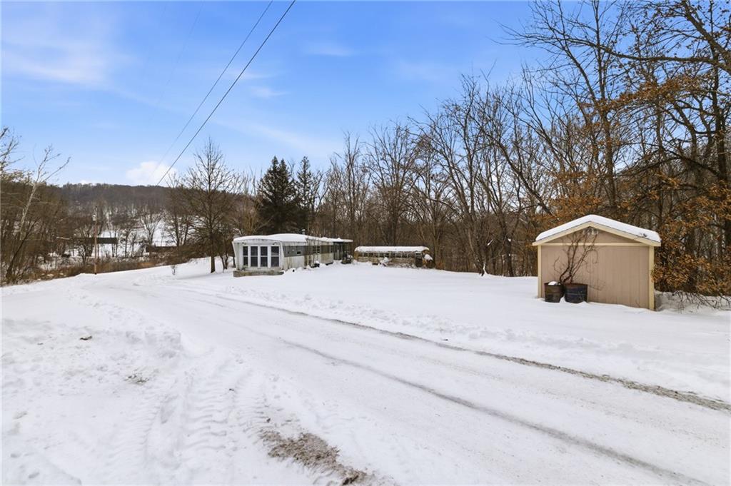 1558 Blackhawk Road Darlington, PA 16115 - Photo 1 of 17 a view of a house with a snow in the yard