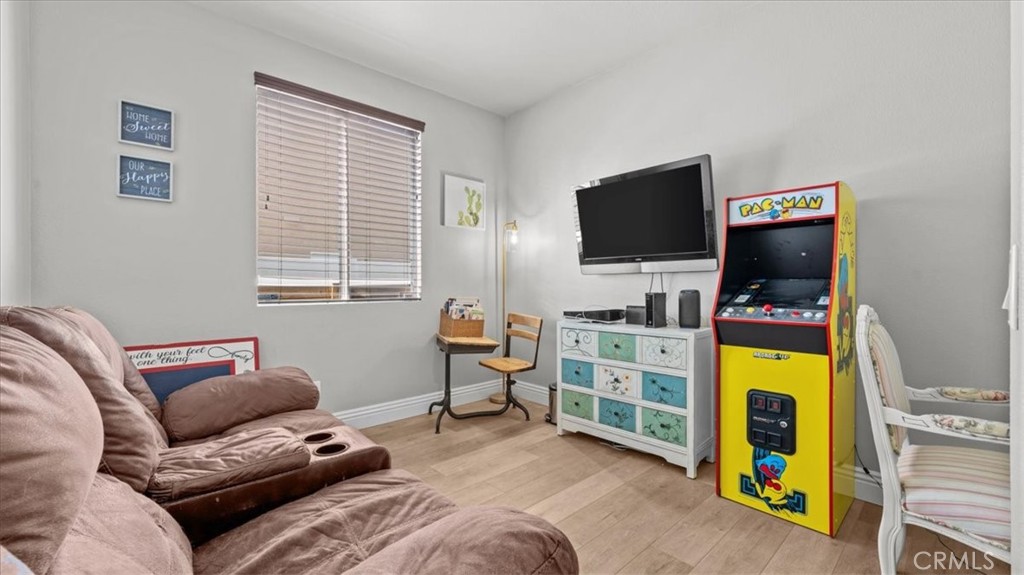 19829 Adirondack Lane Riverside, CA 92508 - Photo 11 of 34 a bedroom with a bed and a flat screen tv