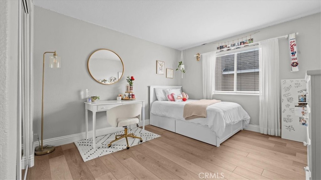 19829 Adirondack Lane Riverside, CA 92508 - Photo 14 of 34 a living room with a bed furniture and a window