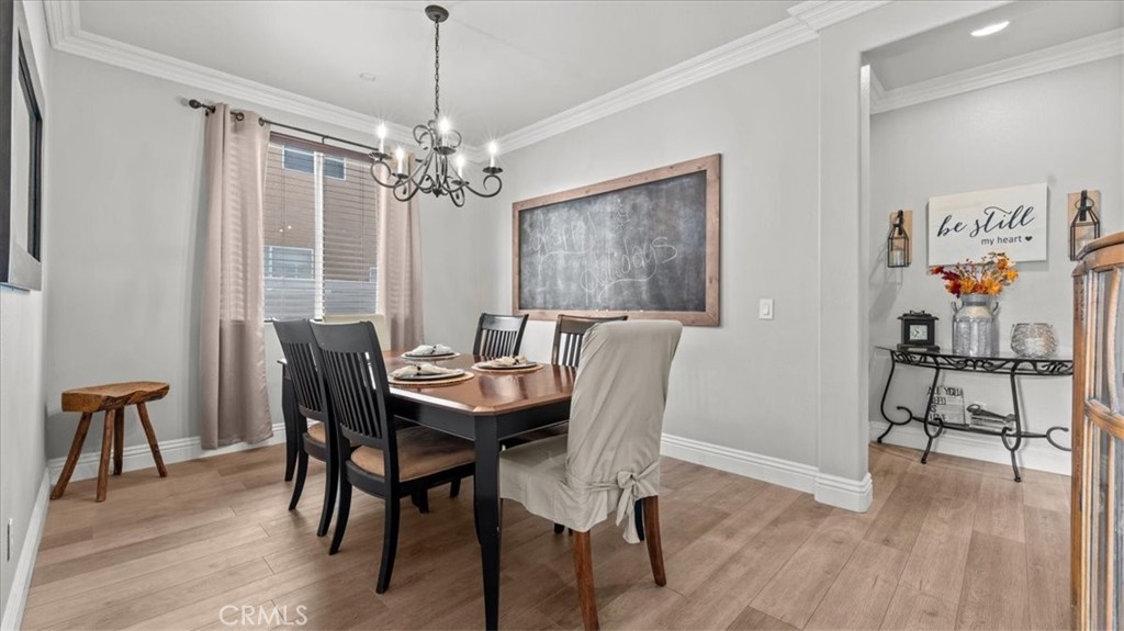 19829 Adirondack Lane Riverside, CA 92508 - Photo 5 of 34 a view of a dining room with furniture window and wooden floor