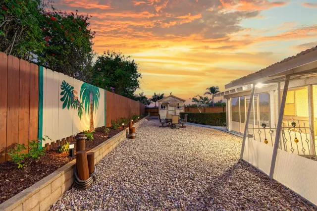 a backyard of a house with lots of green space