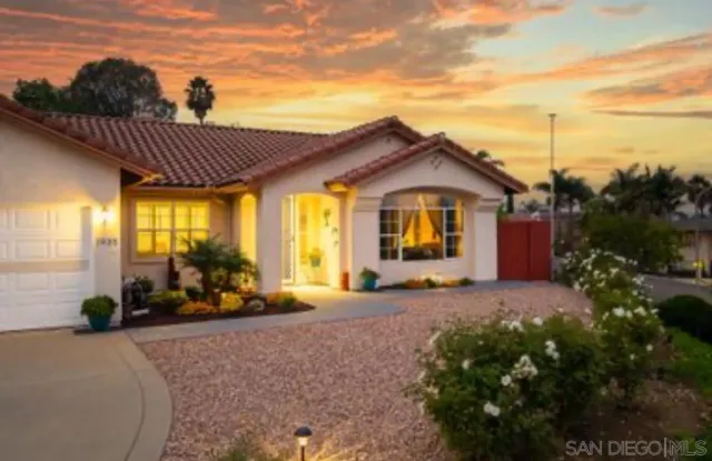 a view of a house with a patio