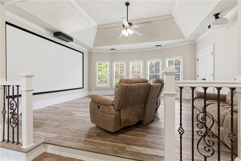 1565 Bramble Bush Way Suwanee, GA 30024 - Photo 24 of 62 a living room with furniture and a large window