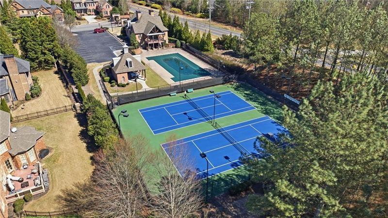 1565 Bramble Bush Way Suwanee, GA 30024 - Photo 41 of 62 an aerial view of a house with a yard