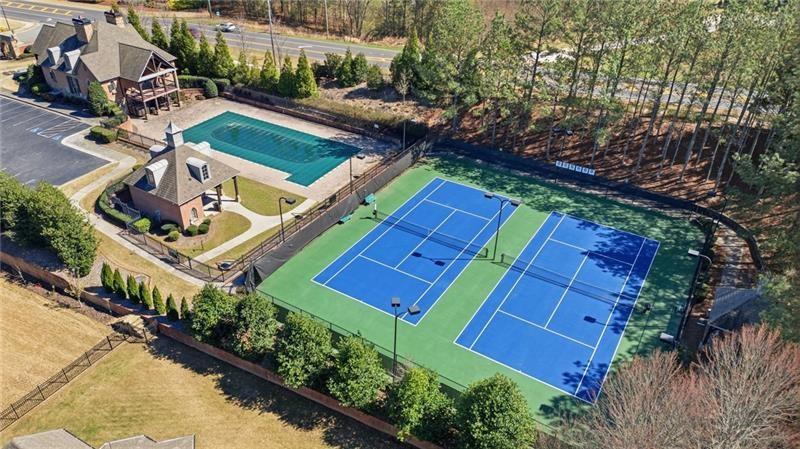 1565 Bramble Bush Way Suwanee, GA 30024 - Photo 42 of 62 an aerial view of a house with a garden