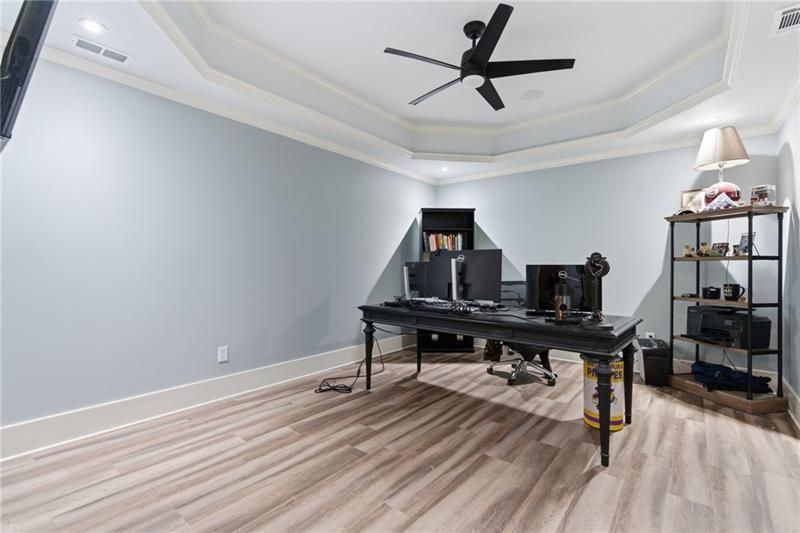 1565 Bramble Bush Way Suwanee, GA 30024 - Photo 51 of 62 a view of a workspace with wooden floor