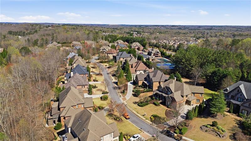 1565 Bramble Bush Way Suwanee, GA 30024 - Photo 60 of 62 an aerial view of residential building with outdoor space