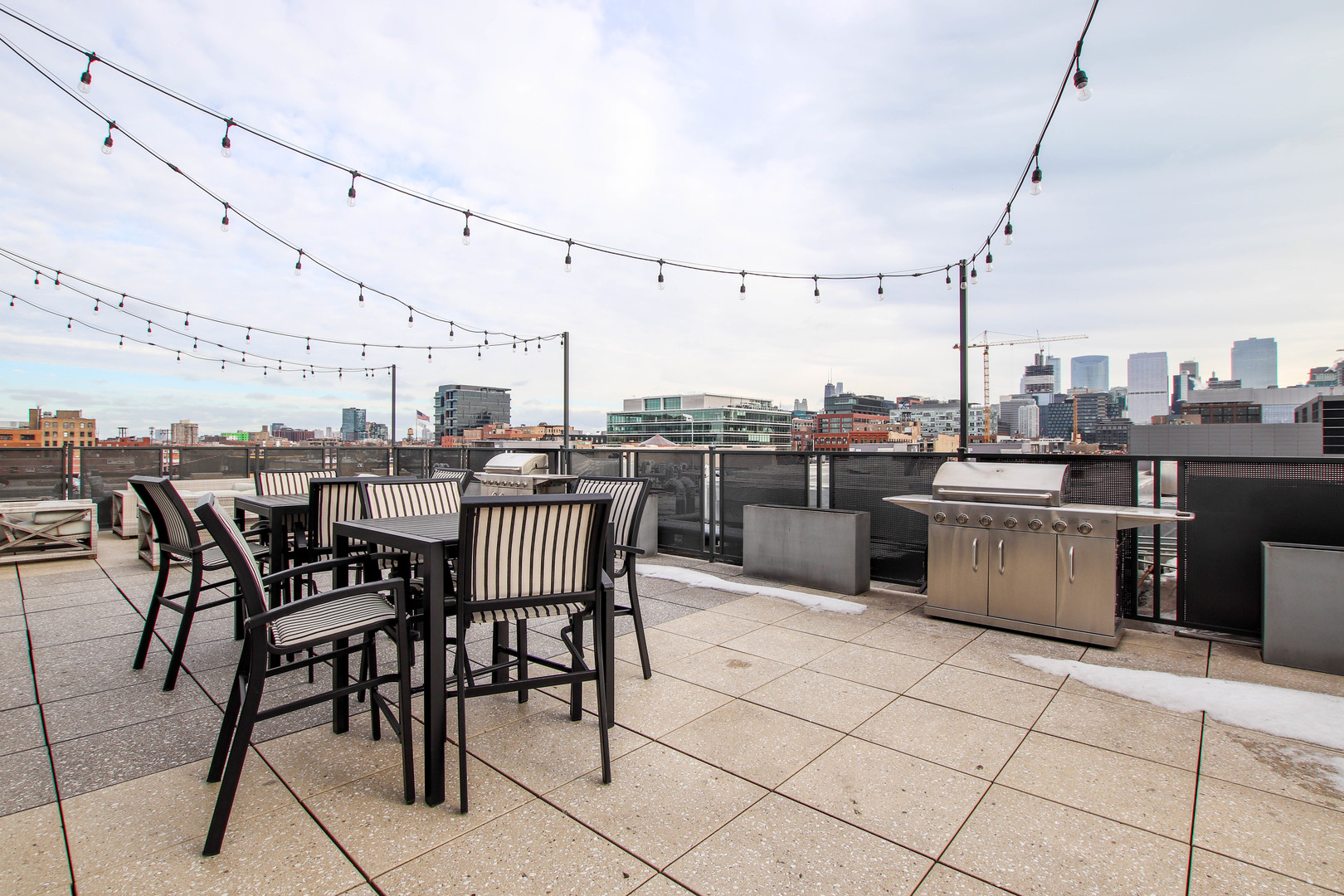 1313 West Randolph Street, Unit 203 Chicago, IL 60607 - Photo 13 of 18 a view of a terrace and furniture