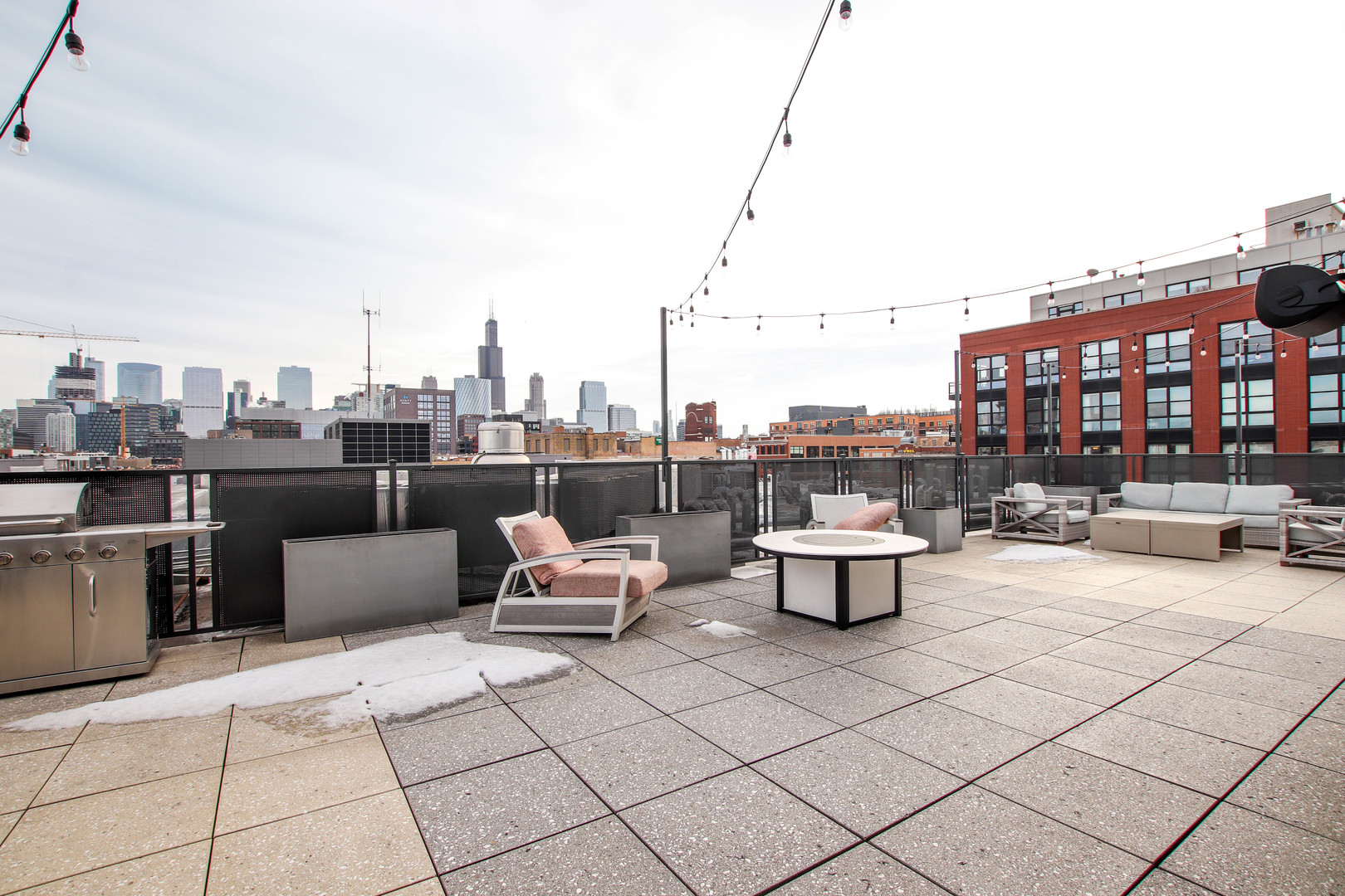 1313 West Randolph Street, Unit 203 Chicago, IL 60607 - Photo 14 of 18 a view of roof with seating space