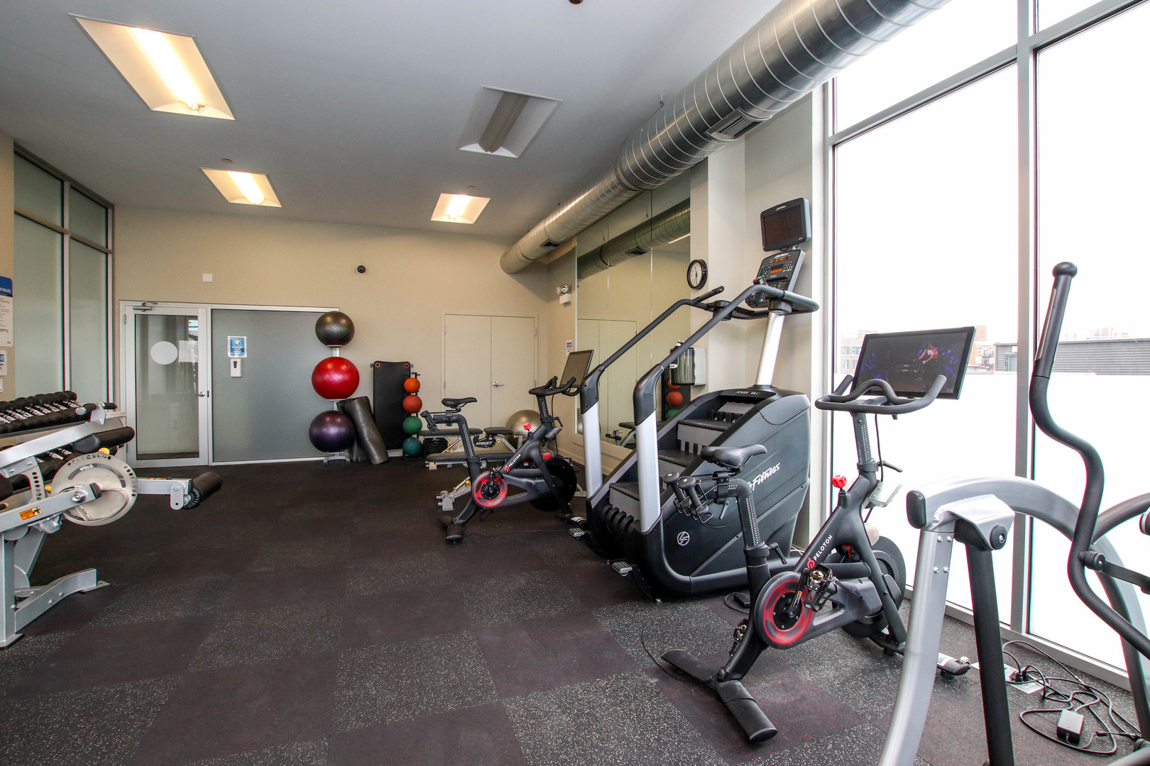 1313 West Randolph Street, Unit 203 Chicago, IL 60607 - Photo 17 of 18 a view of a room with gym equipment