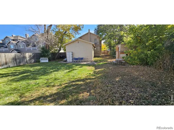 a view of a backyard with a garden