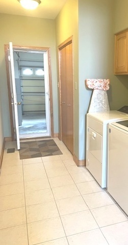 10 Moorings Drive Palos Heights, IL 60463 - Photo 9 of 19 a room with washing machine and storage