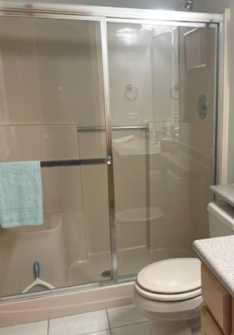 10 Moorings Drive Palos Heights, IL 60463 - Photo 10 of 19 a bathroom with a toilet and a shower