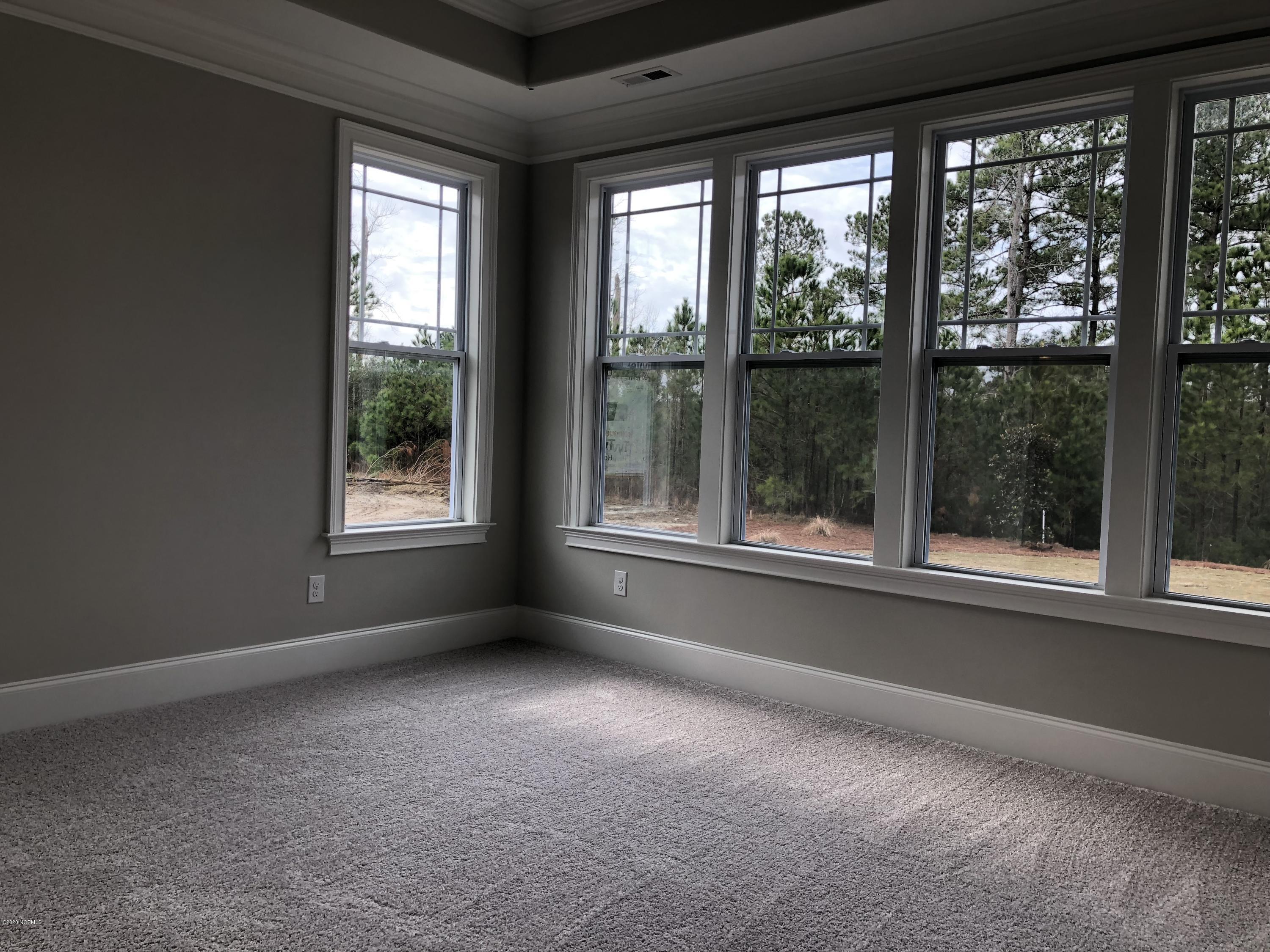 312 Lake Firefly Loop Holly Ridge, NC 28445 - Photo 7 of 21 Master Bedroom