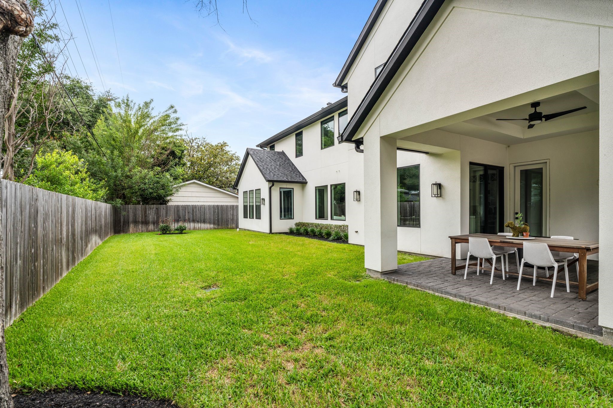 4638 Merwin Street Houston, TX 77027 - Photo 35 of 42 The expansive backyard offers bountiful green space with plenty of room to add a pool.