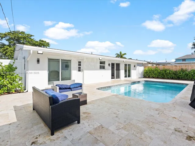 a view of outdoor space yard and swimming pool