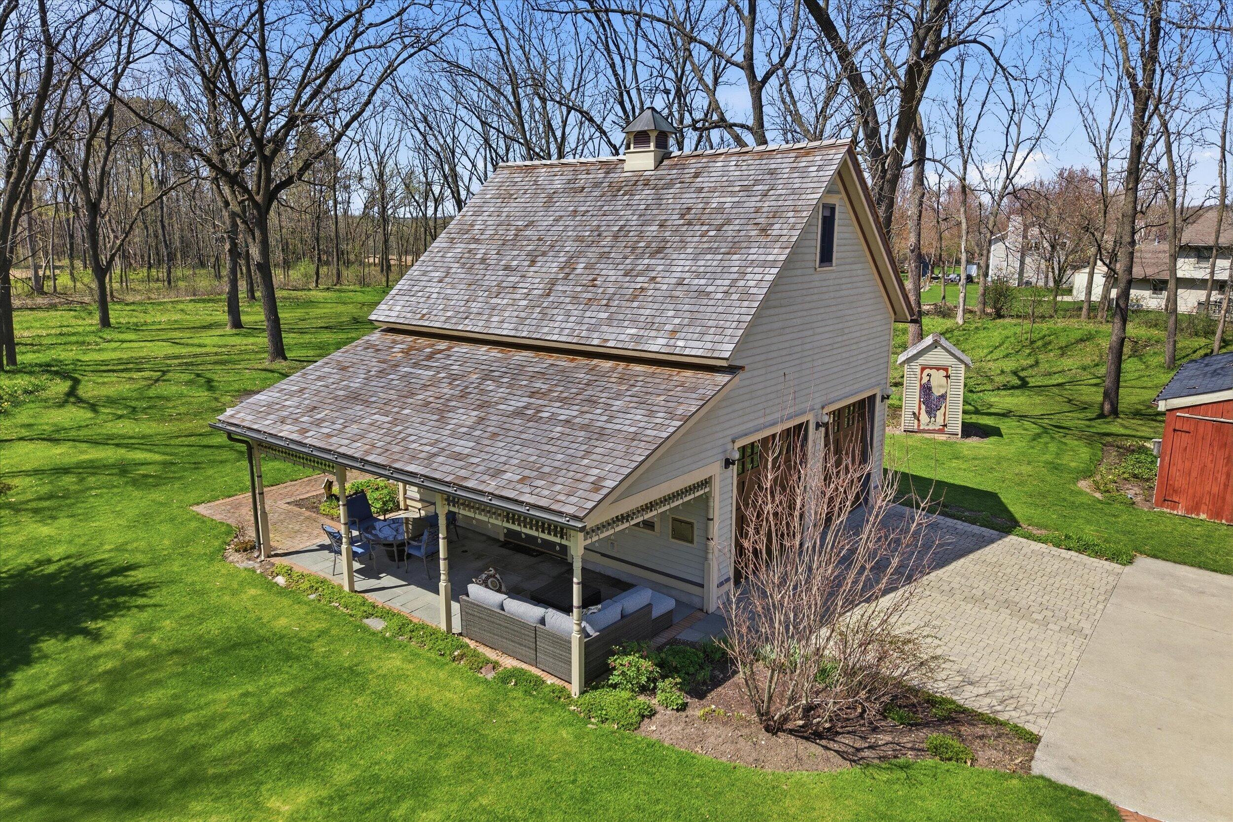 S84W17698 Woods Road Muskego, WI 53150 - Photo 28 of 50 Heated Garage With Partial Kitchen inside + Bonus Room