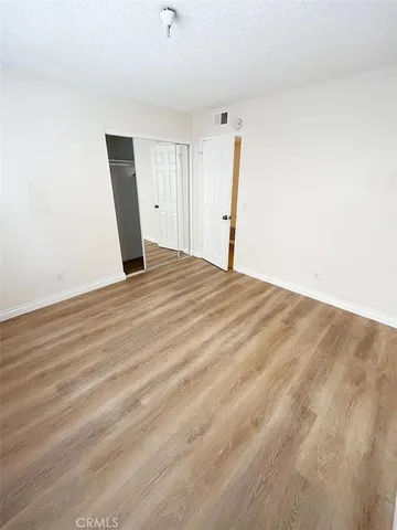a bathroom with a sink vanity and mirror